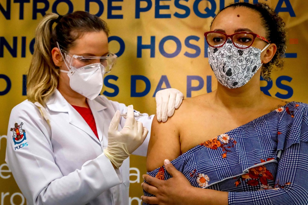 A volunteer receives the Covid-19 vaccine produced by Chinese company Sinovac Biotech at the Sao Lucas Hospital, in Porto Alegre, southern Brazil. Photo: AFP
