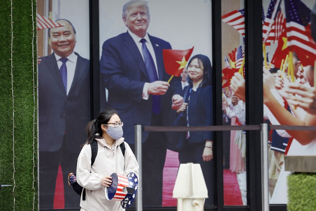 A photo display of Vietnamese Prime Minister Nguyen Xuan Phuc and US President Donald Trump outside a Hanoi hotel. The US-Vietnam relationship could take a turn for the better under a Joe Biden presidency, at least in terms of trade. Photo: EPA-EFE