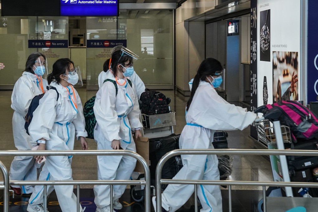 Travellers at Hong Kong International Airport. Photo: Bloomberg