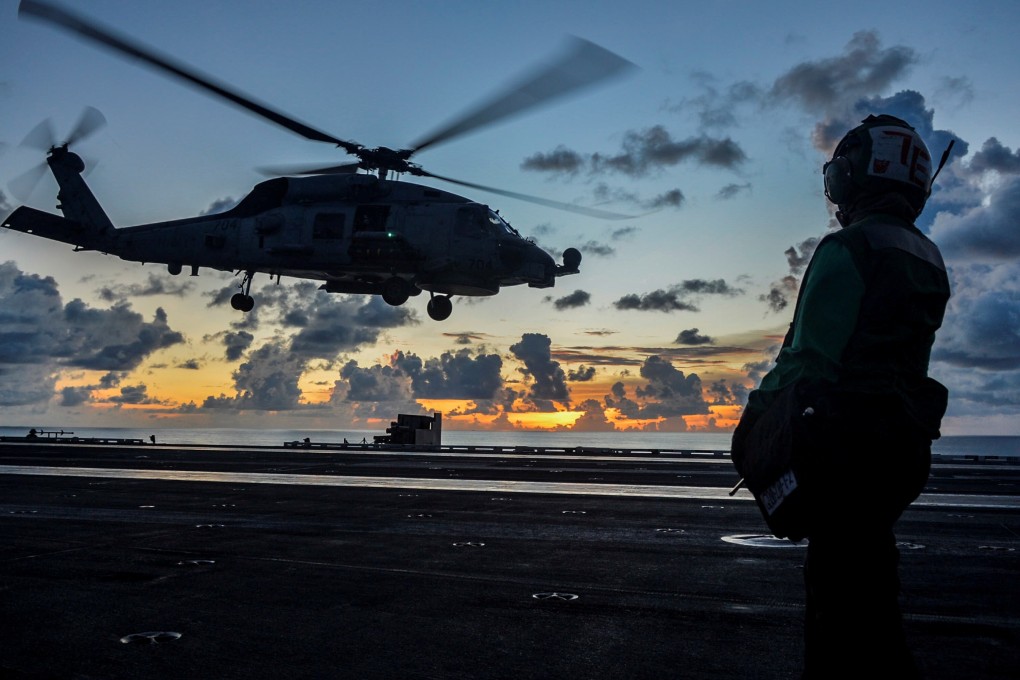 A Sea Hawk helicopter during flight operations aboard the USS Ronald Reagan aircraft carrier in the South China Sea in July. Photo: Reuters