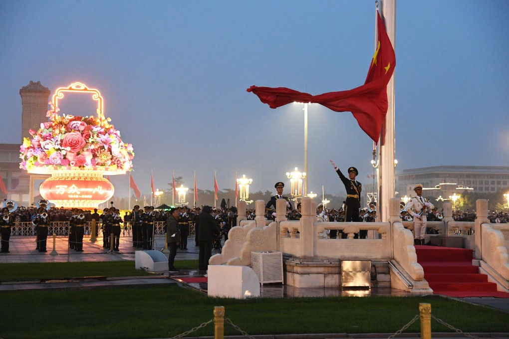 Soldiers perform a flag-raising ceremony to celebrate the 71st anniversary of the founding of the People’s Republic of China, in Tiananmen Square, Beijing, on October 1. Photo: Xinhua