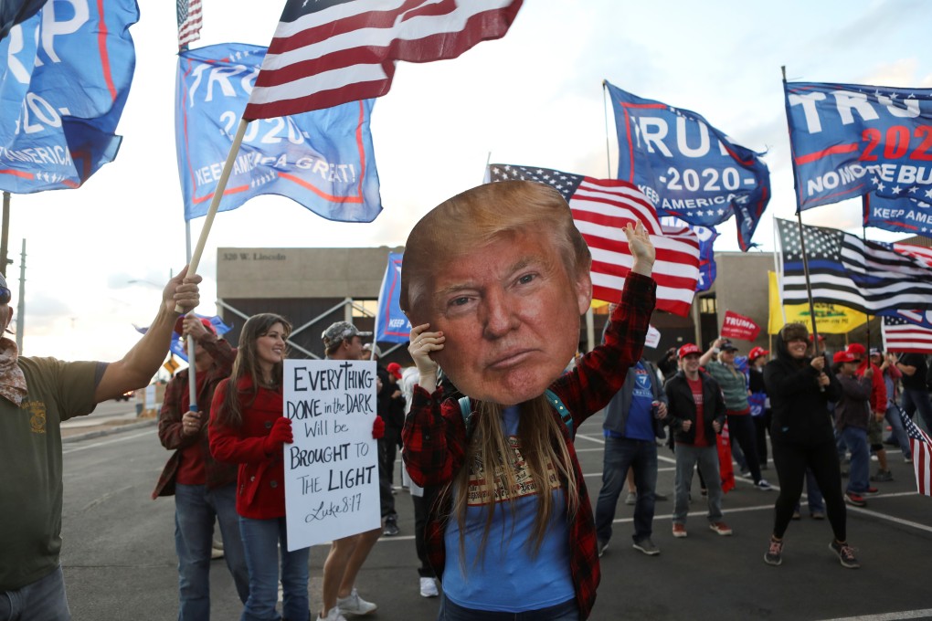 Supporters of US President Donald Trump gather at a protest in front of the Maricopa County Tabulation and Election Centre in Phoenix, Arizona, on November 8. Photo: Reuters