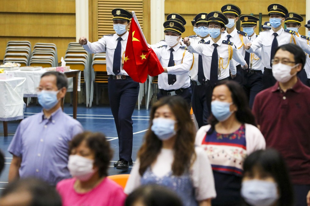Events aimed at fostering a sense of national identity, like flag-raising ceremonies, are likely to become more common. Photo: May Tse