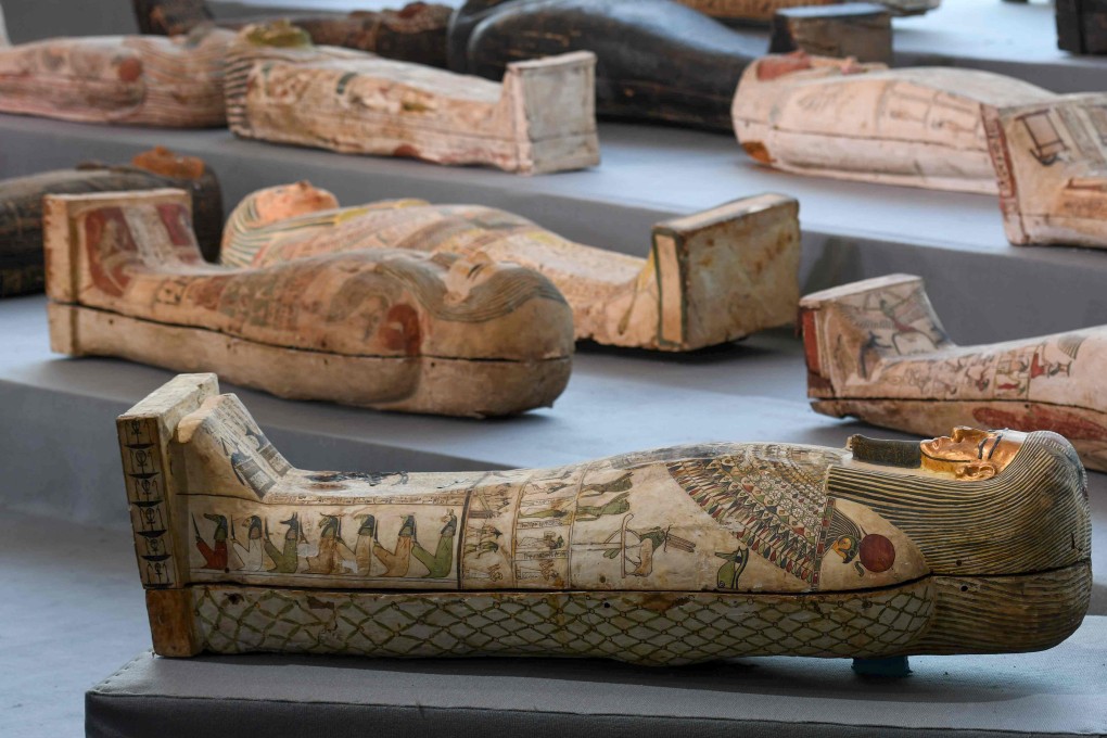 Wooden sarcophagi on display during the unveiling of an ancient treasure trove of more than a 100 intact sarcophagi, at the Saqqara necropolis near Cairo, Egypt, on Saturday. Photo: AFP