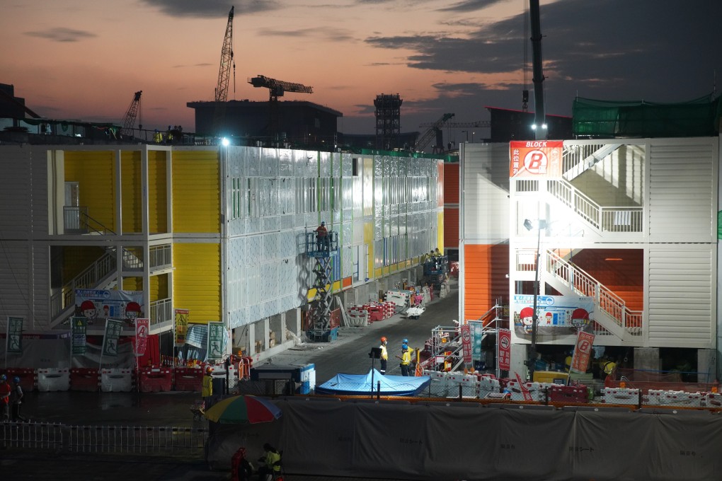 Work on the temporary hospital continues round the clock. Photo: Winson Wong