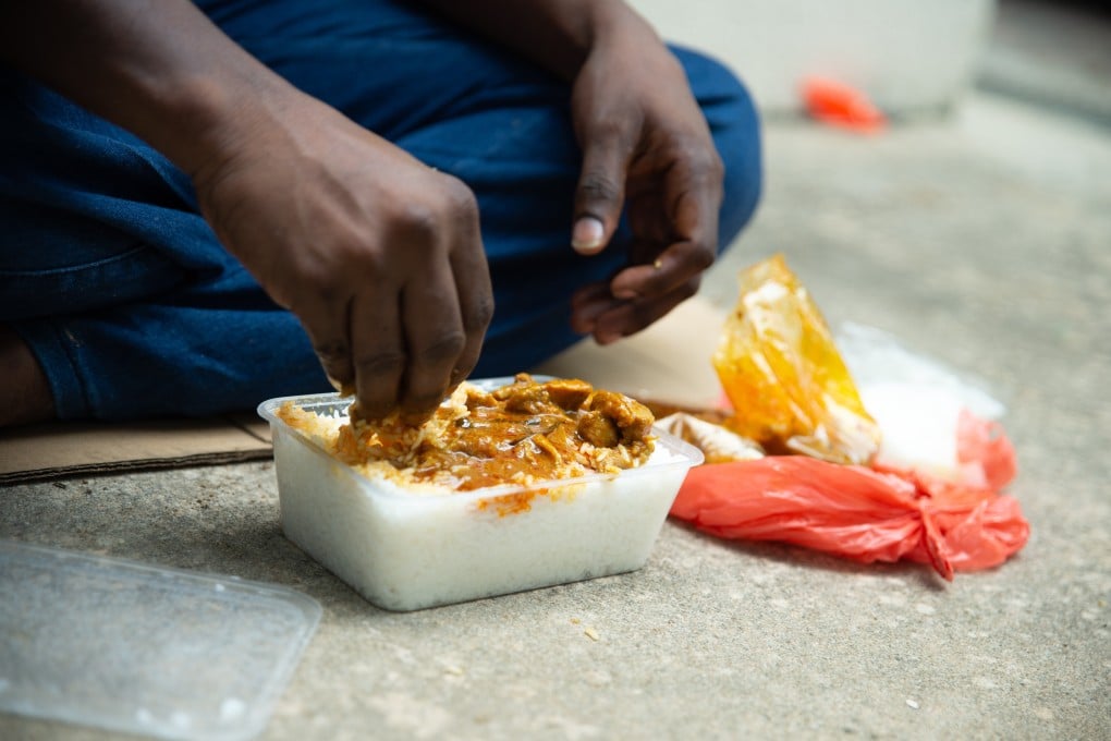 By the time many labourers sit down to eat, their packed lunch has been left outside for hours. Photo: Olyvia Lim