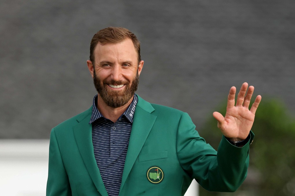 Dustin Johnson of the United States waves during the Green Jacket Ceremony after winning the Masters at Augusta National Golf Club in Georgia, US on Sunday. Photo: Getty Images / AFP