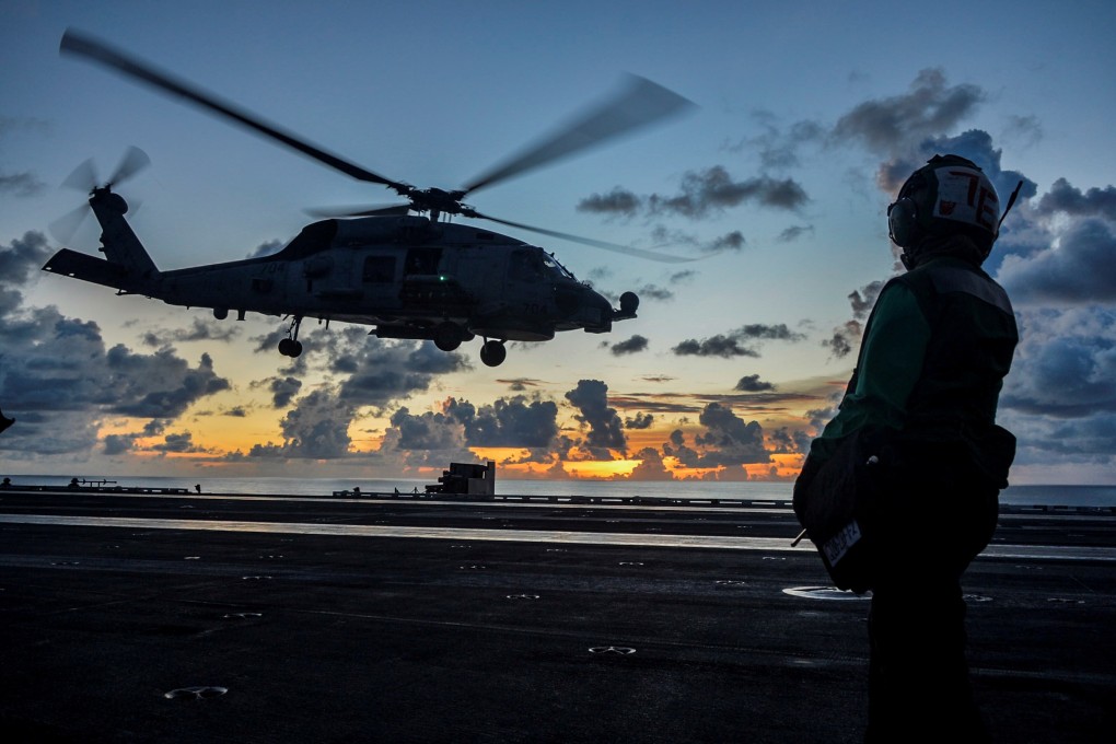 A Sea Hawk helicopter lifts off from the American aircraft carrier USS Ronald Reagan during an exercise in the South China Sea in July. Photo: Reuters