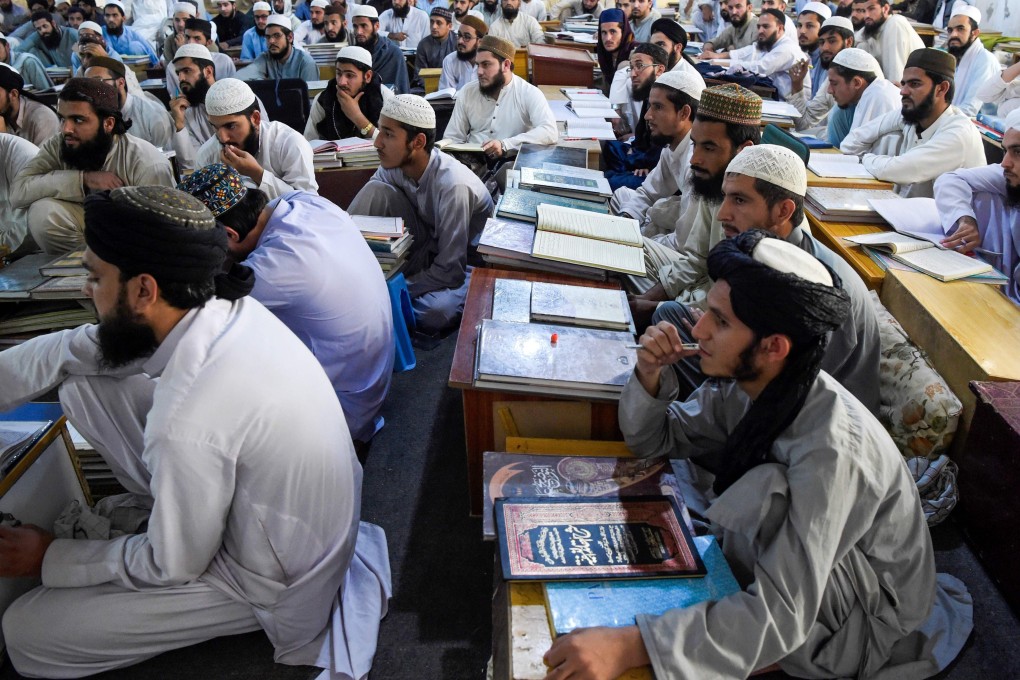 Islamic seminary students attend class at the Darul Uloom Haqqania seminary in Akora Khattak. Photo: AFP