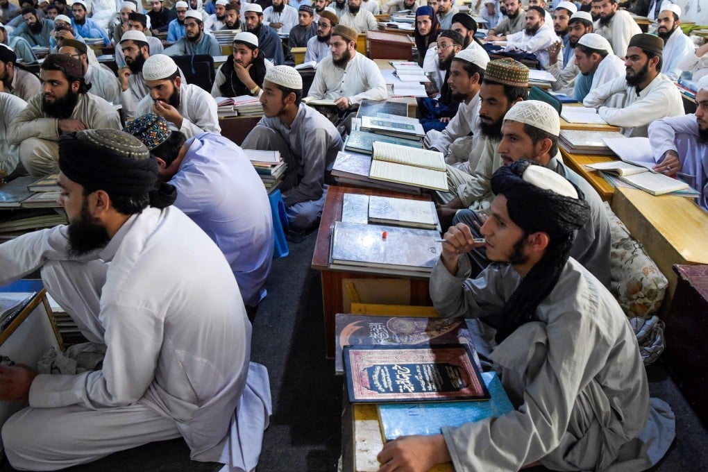 Islamic seminary students attend class at the Darul Uloom Haqqania seminary in Akora Khattak. Photo: AFP