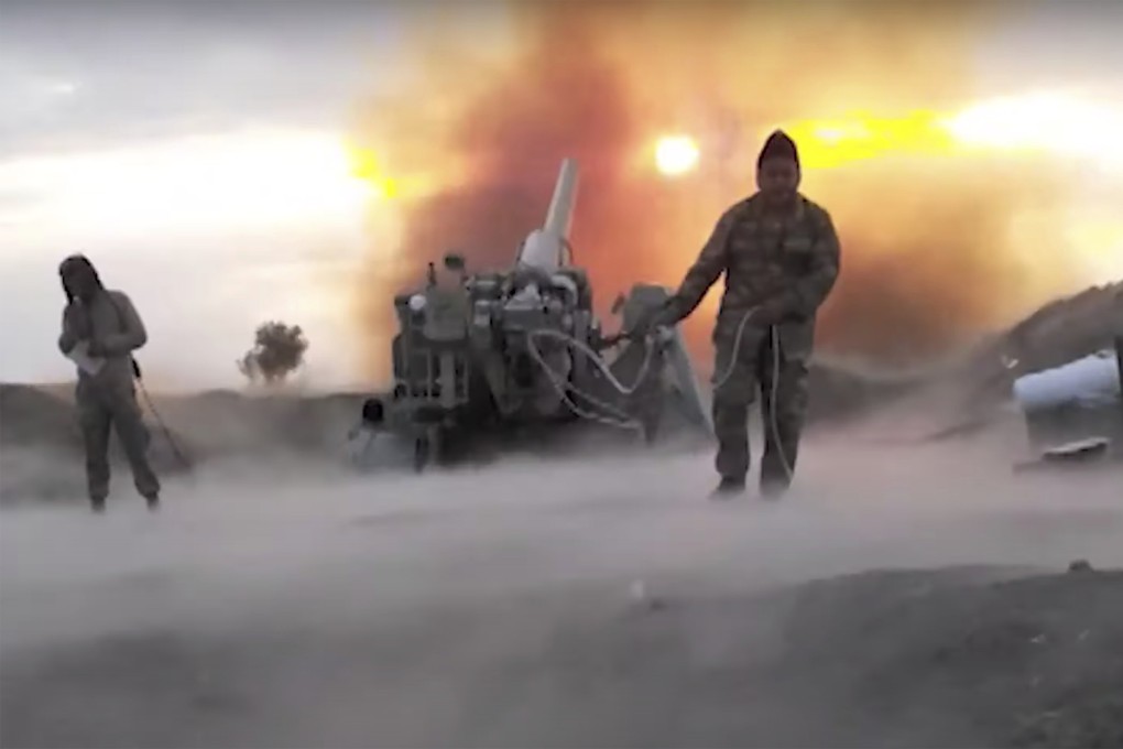 Azerbaijan army soldiers fire artillery during fighting for control of Nagorno-Karabakh. Photo: AP