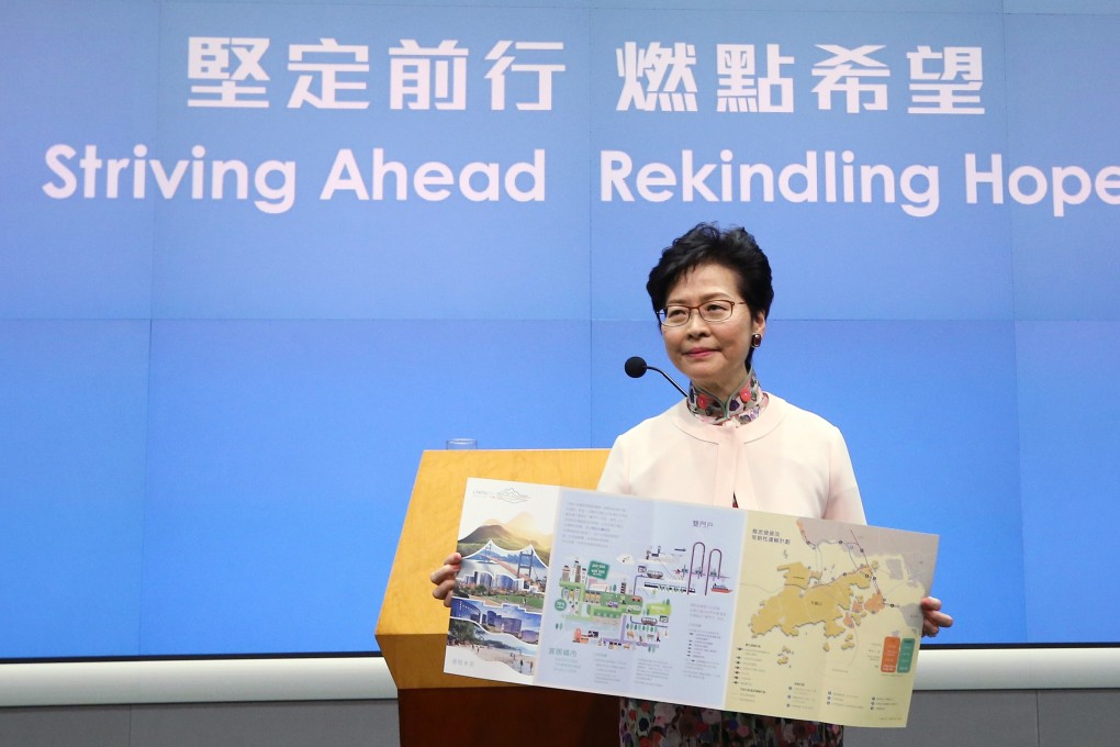 Chief Executive Carrie Lam Cheng Yuet-ngor displays a pamphlet about her newly unveiled “Lantau Tomorrow Vision” proposal, at the government headquarters in Admiralty on October 10, 2018. The 1,700 hectare reclamation project was the cornerstone of her second policy address as Hong Kong leader. Photo: Dickson Lee
