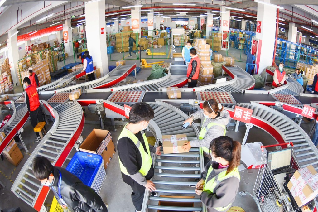 Workers sorting out packages at a centre in Lianyungang in eastern Jiangsu province on November 11 during the record-breaking Singles' Day shopping spree. Photo: Xinhua