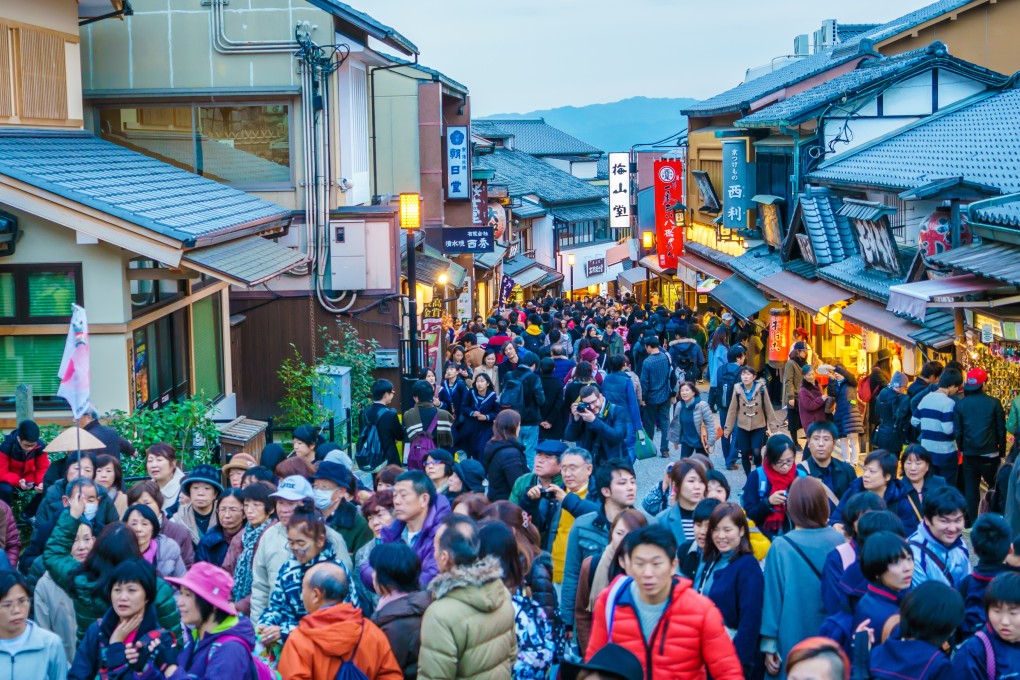 Tourists in the streets around Kiyomizu temple, in Kyoto, in the pre-pandemic era. Photo: Shutterstock