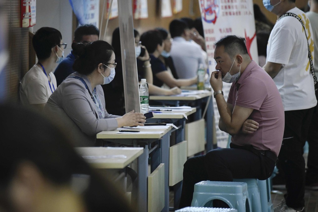 In October, the surveyed jobless rate was 5.3 per cent, down from 5.4 per cent in September, according to the National Bureau of Statistics (NBS). Photo: AFP