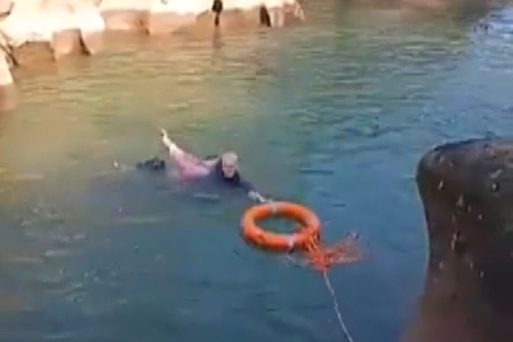 A screen grab from an online video showing British consulate general Stephen Ellison rescuing a woman from a river in Chongqing on Saturday. Photo: British diplomatic mission in China via Twitter