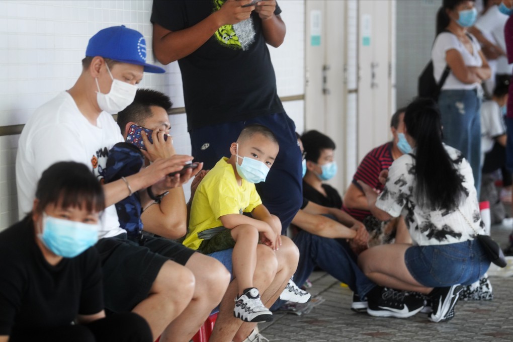 Families queue for Covid-19 tests at Saint Teresa’s Hospital in Mong Kok in July, in the early days of the third wave in Hong Kong. Photo: Winson Wong