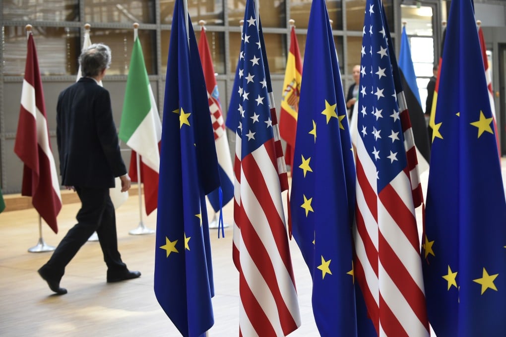 US and European Union flags at EU headquarters in Brussels in 2017, ahead of a visit by US President Donald Trump. Photo: AFP
