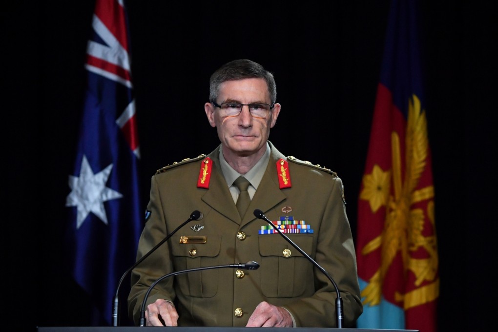 Chief of the Australian Defence Force General Angus Campbell delivers the findings from the Afghanistan inquiry. Photo: AFP