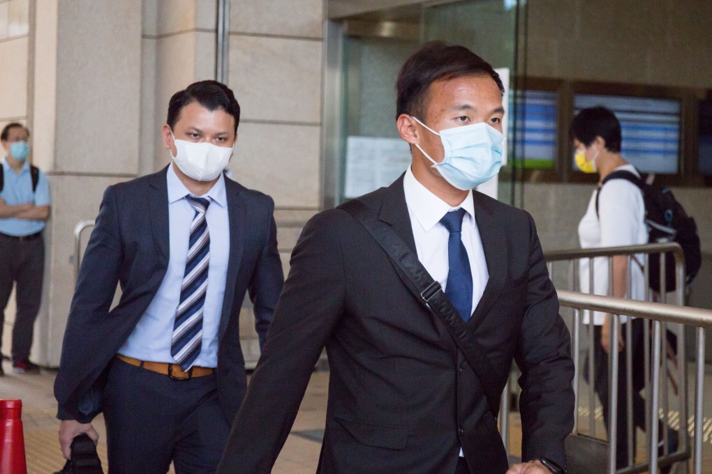 Constable Yim Cheuk-fan (front) and Constable Fong Chun-kwok appear at West Kowloon Court on Thursday. Photo: Brian Wong
