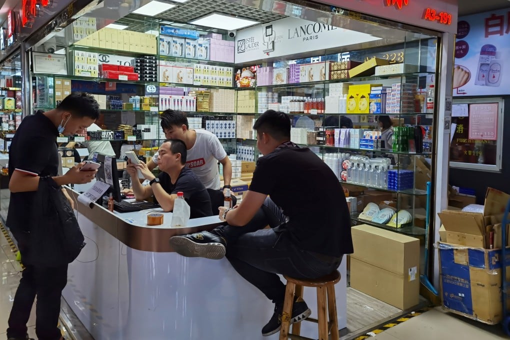 Cosmetics sellers in Mingtong Digital City market in Shenzhen’s Huaqiangbei area. Photo: Reuters/David Kirton