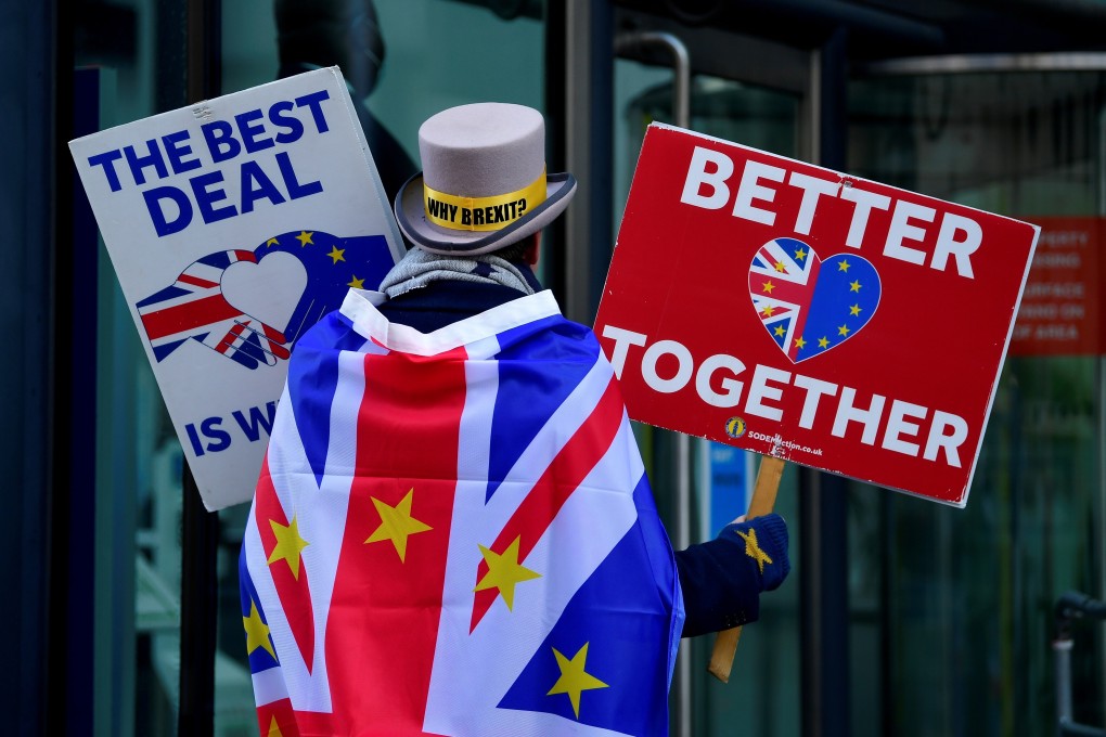 An anti-Brexit protester demonstrates outside the conference centre where the trade deal negotiations are taking place in London on November 9. Photo: Reuters
