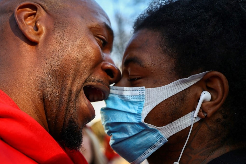 A supporter of US President Donald Trump clashes with a protester during an anti-Trump rally in the aftermath of the 2020 US presidential election, at Black Lives Matter Plaza in Washington on November 13. Photo: Reuters