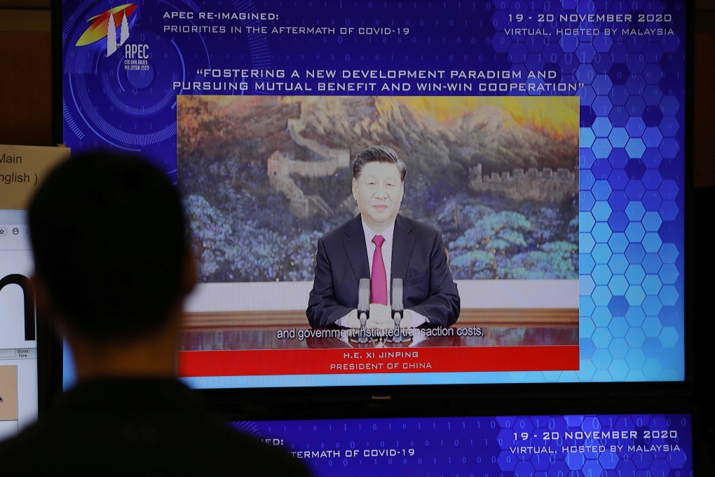 A video screen shows Chinese President Xi Jinping speaking to fellow Apec members. Photo: Reuters