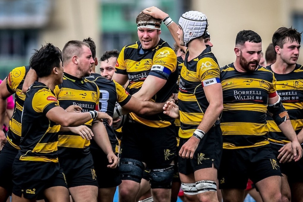 Tigers teammates congratulate substitute Craig Lodge after scoring the game-winning try at King’s Park. Photo: Ike Images