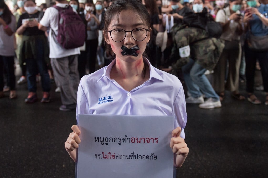 Nalinrat Tuthubthim, who claims she was sexually abused by a teacher, during a pro-democracy protest in Bangkok. Photo: Reuters