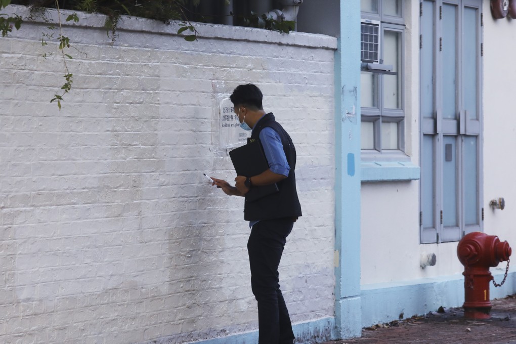 A member of the team of officers from the Hong Kong police’s national security unit that arrived at Chinese University in Sha Tin on November 20 to investigate a student protest the previous day. Photo: Dickson Lee