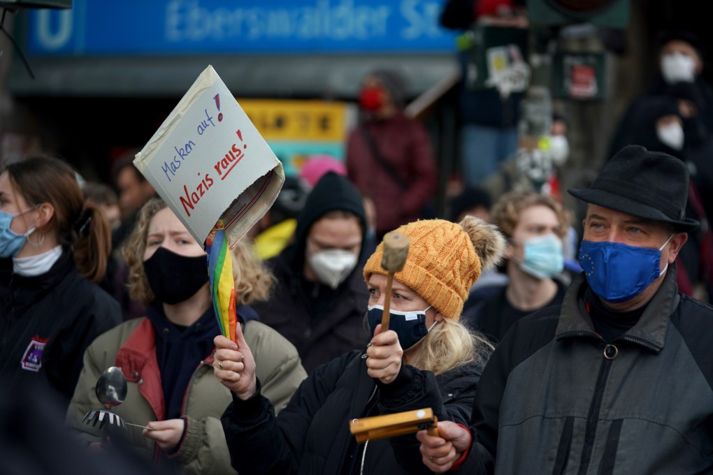 Counter protesters during a demonstration against German coronavirus restrictions in Berlin, Germany on Sunday. Photo: EPA-EFE