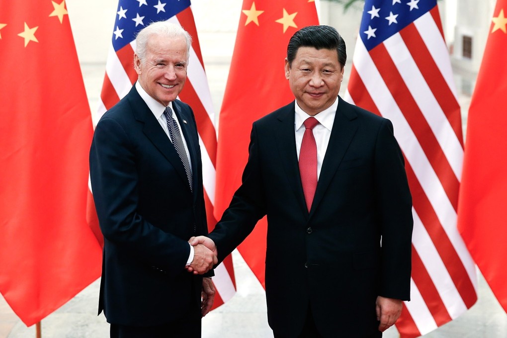 Joe Biden with Chinese President Xi Jinping in December 2013. Photo: TNS