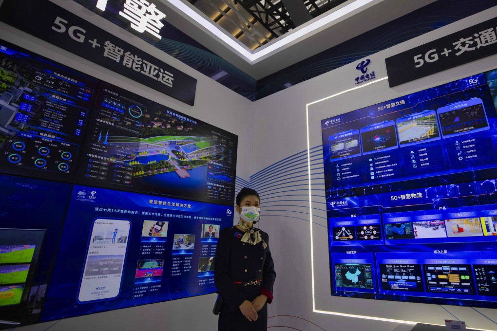 A woman stands in the China Telecom booth at the 7th World Internet Conference on 23 November 2020. Photo: EPA-EFE
