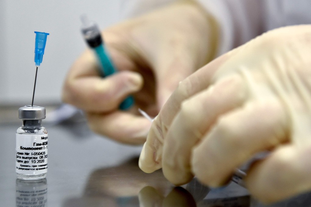 A nurse prepares to inoculate a patient with Russia’s coronavirus vaccine during post-registration trials. Photo: AFP