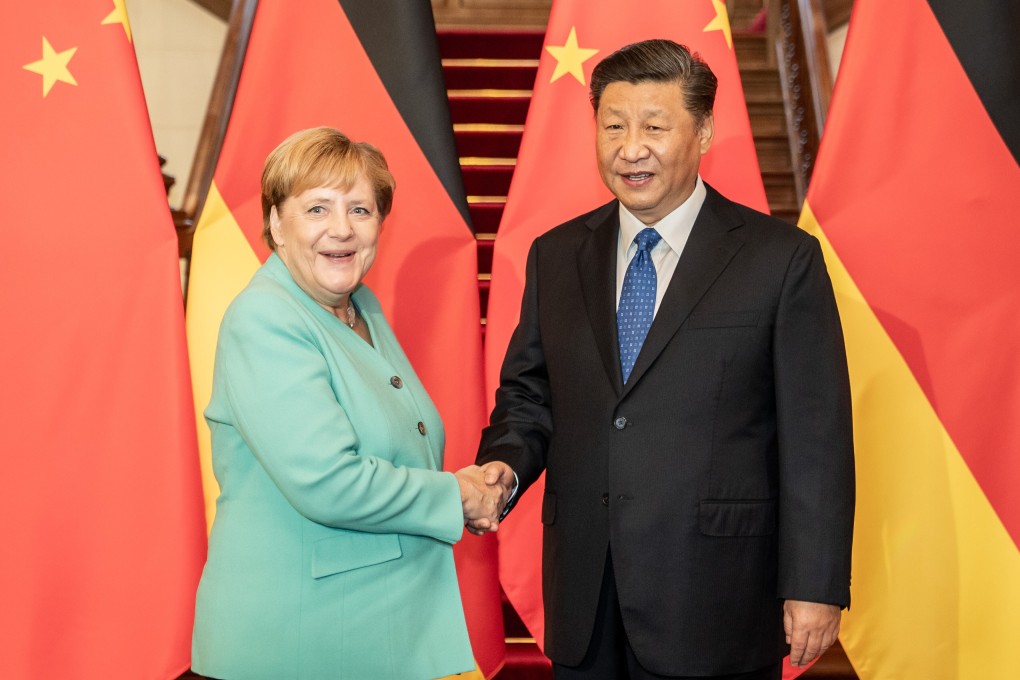 German Chancellor Angela Merkel and Chinese President Xi Jinping during talks in Beijing last year. Xi told Merkel by phone on Tuesday that Chinese economic development would benefit Germany. Photo: dpa