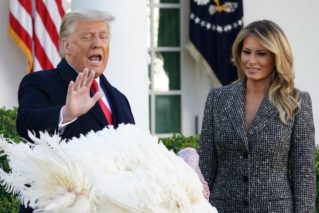 First lady Melania Trump looks on as US President Donald Trump pardons Corn the turkey at the Rose Garden of the White House on Tuesday. Photo: AFP