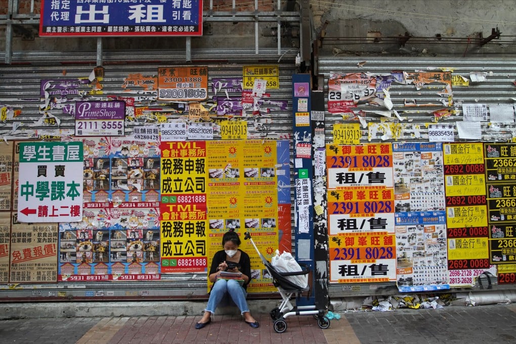 Closed shops in Hong Kong’s Mong Kok district. Many companies that have recently decided to offload assets have been forced to sell at losses. Photo: Winson Wong
