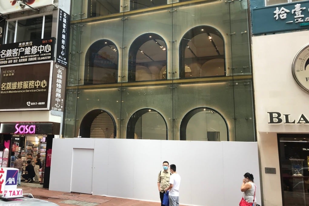 The La Perla store on Russell Street in Causeway Bay in Hong Kong closed earlier this year amid protests and Covid-19 restrictions, leaving an empty shopfront and little festive cheer.