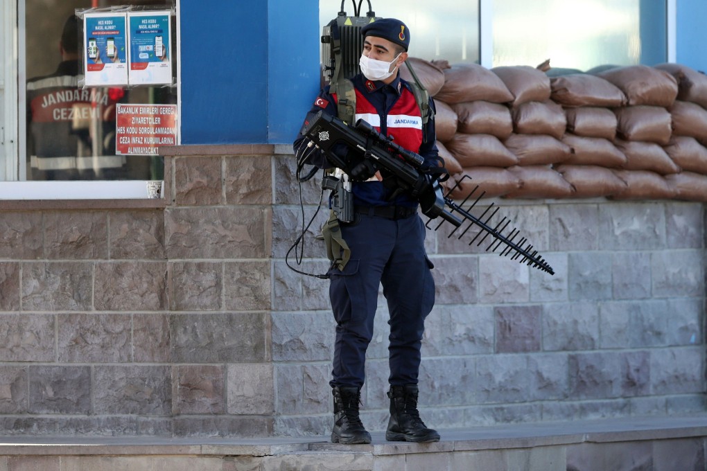 A Turkish soldier patrols next to the entrance of the Sincan Penal Institution near Ankara, as a court handed down verdicts in one of the main trials stemming from the bloody 2016 coup attempt against President Recep Tayyip Erdogan. Photo: AFP