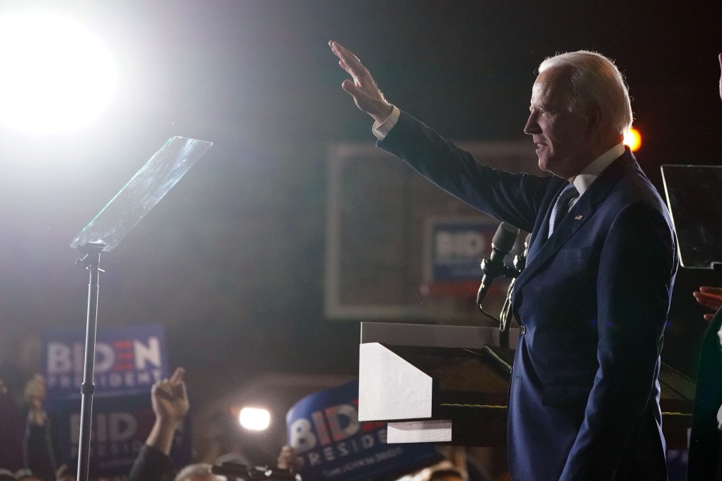 Joe Biden, then a Democrat election candidate, waves to supporters at a rally on Super Tuesday primary election night at the Baldwin Hills Recreation Centre in Los Angeles on March 3. Biden won the US presidential election after doing something almost no other major presidential candidate has done on the campaign trail: he promised to raise taxes. Photo: PDA