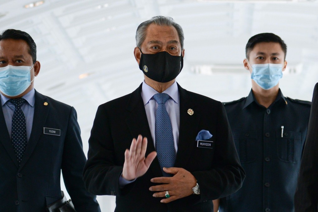 PM Muhyiddin Yassin arrives for a session at the Malaysian Parliament in Kuala Lumpur on November 26, 2020. Photo: AFP
