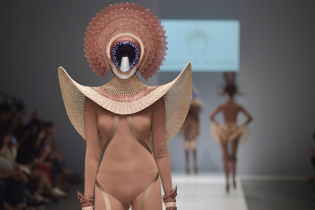 A model wears creations by Indonesian designer Rinaldy Yunardi during the 2016 Indonesian Fashion Week in Jakarta. The famous names that have worn his creations include Taylor Swift. Photo: AFP