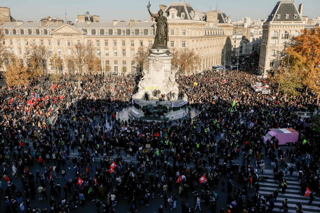 People gather on the Place de La Republique square in Paris for a protest against a draft security law. Photo: AFP