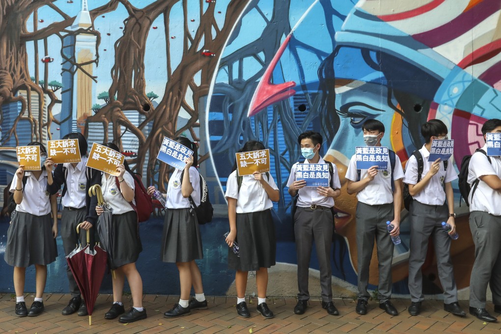 School pupils form a human chain in Wan Chai as a protest during the social unrest in Hong Kong in September, 2019. Photo: Nora Tam