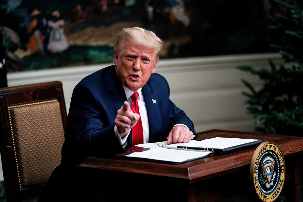 US President Donald Trump speaks from the White House during a videoconference with members of military on Thursday. Photo: Bloomberg