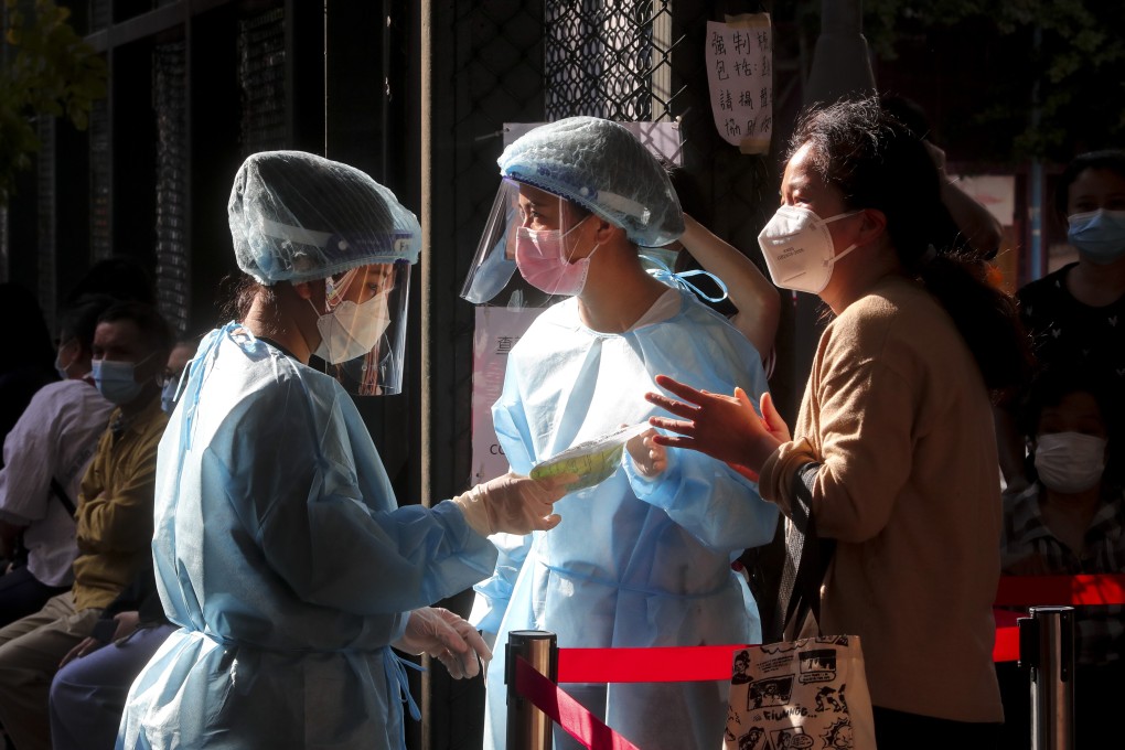 People queue up for Covid-19 testing at a community centre in Hong Kong. Photo: Edmond So