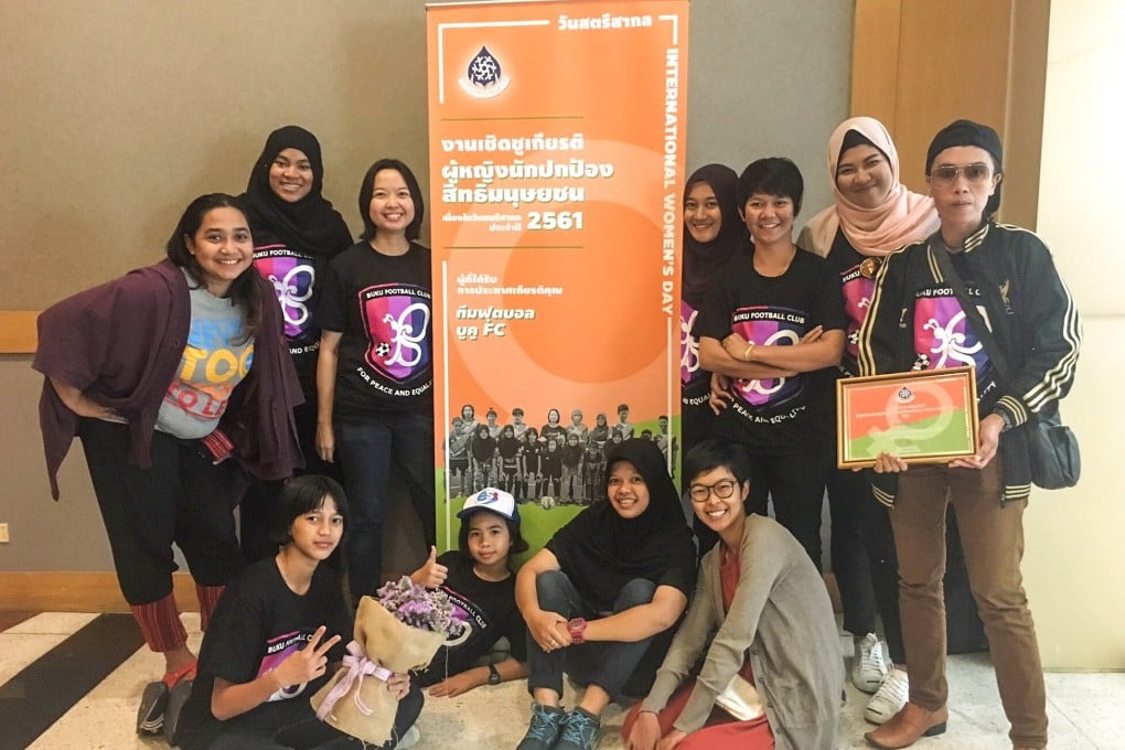 Members of Buku FC pose for a picture. Photo: Sutharee Wannasiri / Twitter