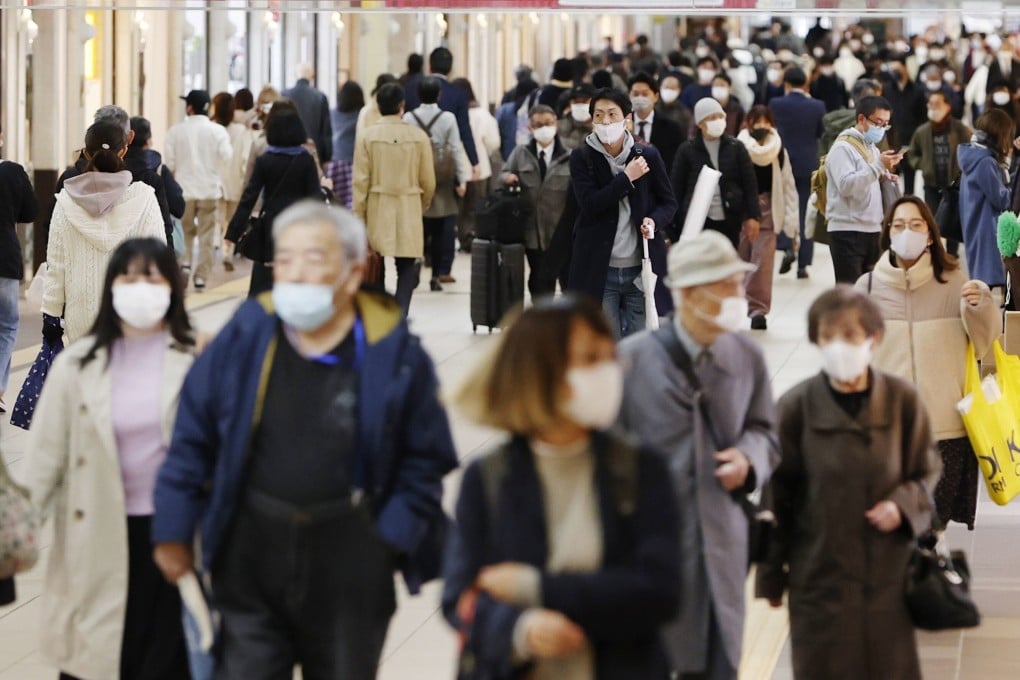 People seen in face masks in Sapporo, Hokkaido, where Covid-19 cases have been fast rising. Photo: Kyodo