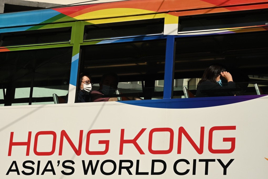 An advertisement on the side of a tram promotes Hong Kong’s international appeal. Photo: AFP